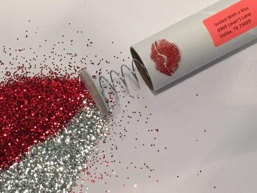 Spring-Loaded Glitter Bomb with a Sealed With a Kiss Sticker