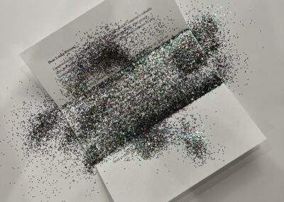 An open glitter letter mail prank by Best Pranks By Mail.