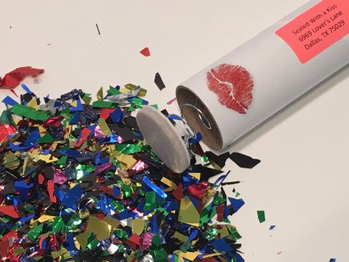 Spring-Loaded Glitter Bomb With a Sealed With a Kiss Sticker