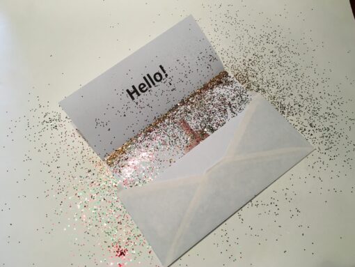 Middle finger prank in envelope with glitter.
