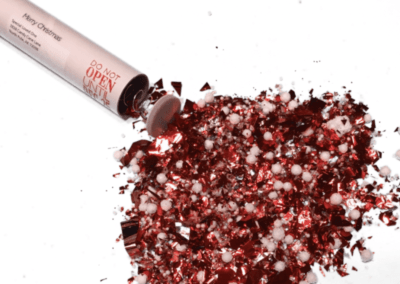 Christmas spring-loaded glitter bomb mailed by Best Pranks By Mail.