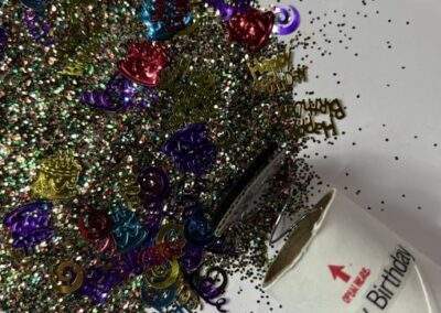 Celebrate them with a Happy Birthday Spring-Loaded Glitter Bomb
