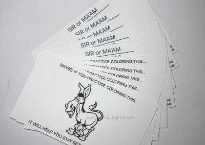 A stack of our bad parking business cards.